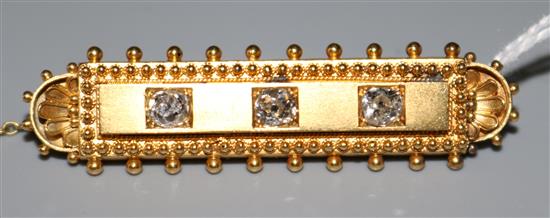 3 stone diamond and gold bar brooch